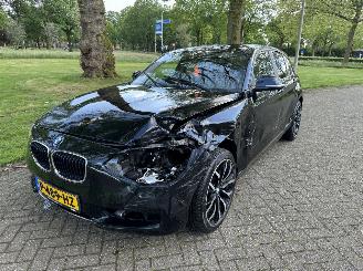 skadebil oplegger BMW 1-serie  2014/1